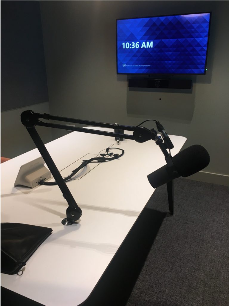 image of a microphone in a podcast studio
