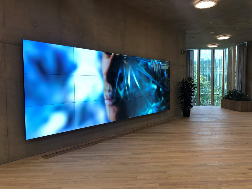 image of an ISDM Solutions Video display in a hallway