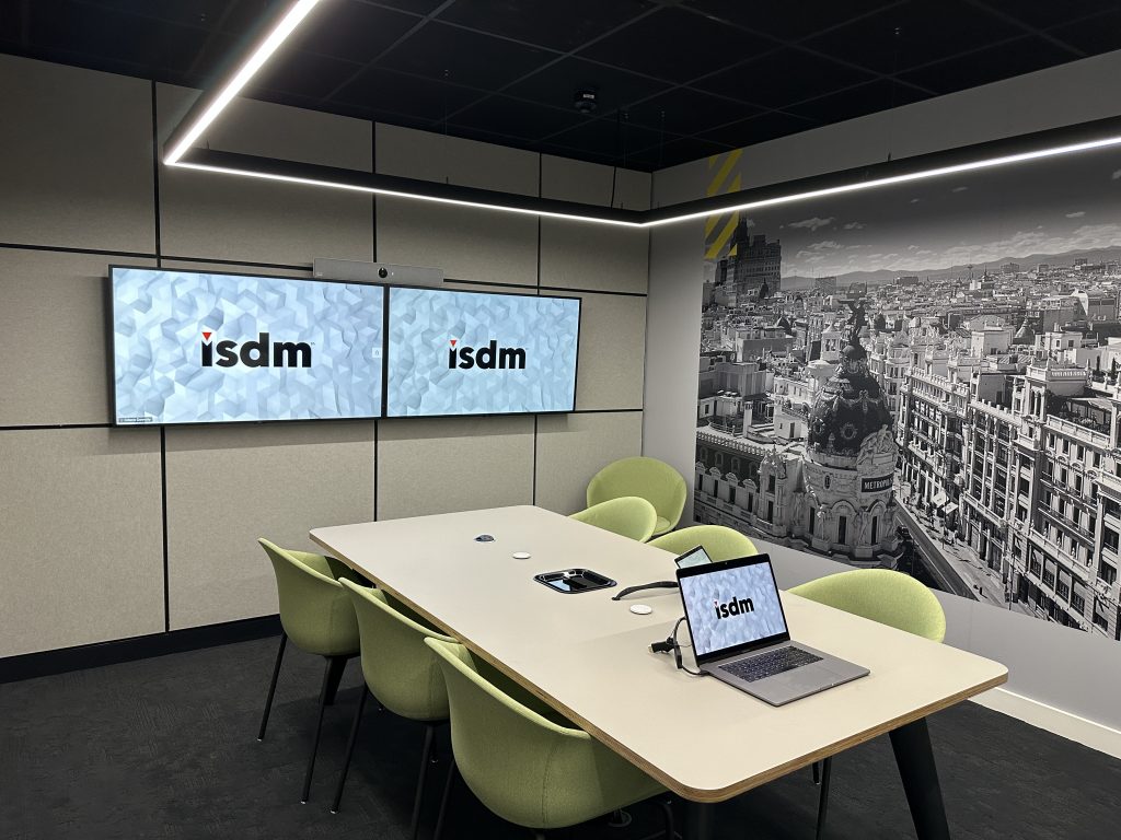 image of an ISDM Meeting Room with dual screen and six chairs