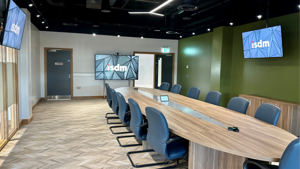 An image showing an audio visual system in place in a large boardroom