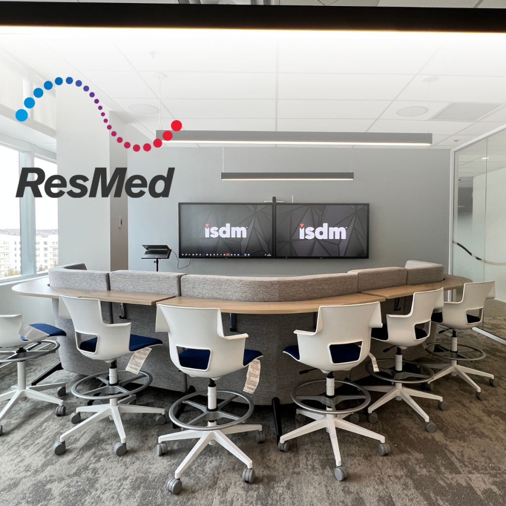 ResMED logo over an ISDM meeting room space
